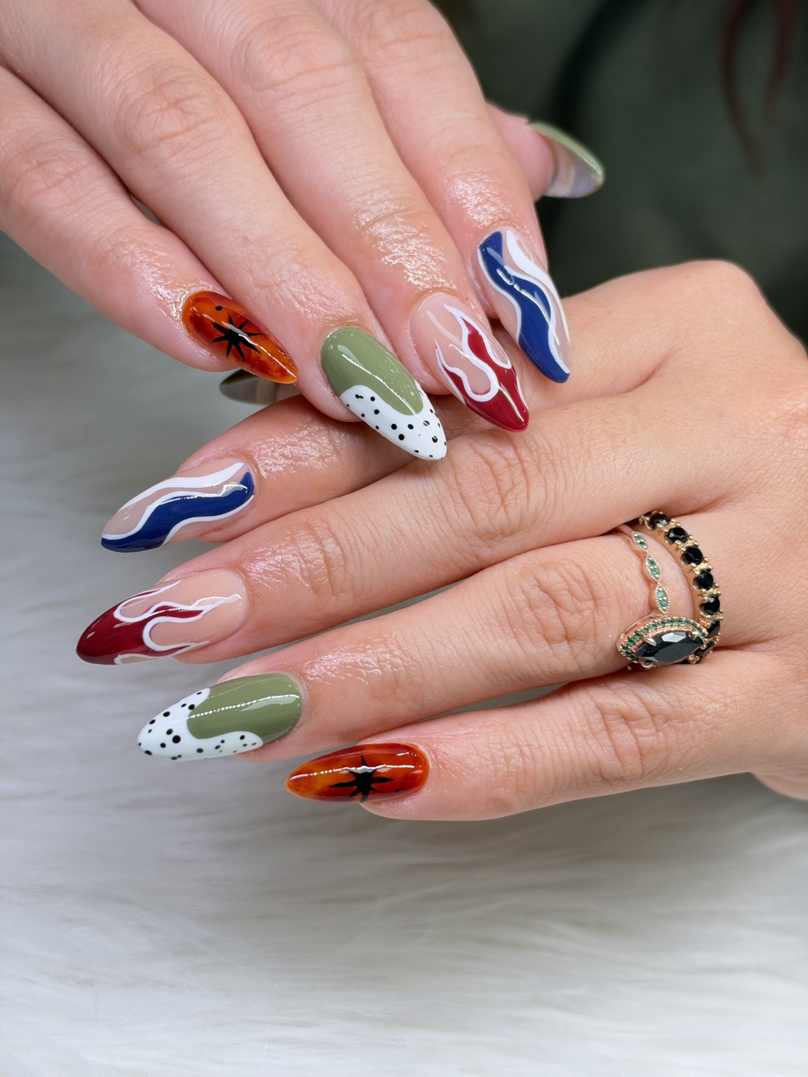 Colorful custom nail art by Beauty Nails in Crawfordville